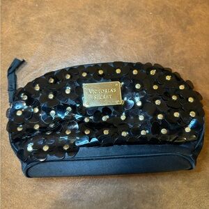 EUC Victoria’s Secret black and gold flower makeup bag.
